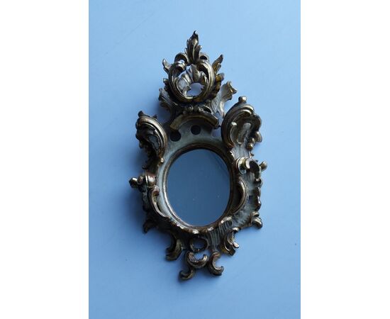 Delicate small mirror