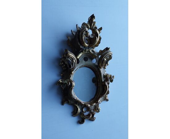 Delicate small mirror