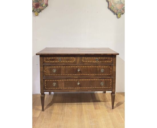 Neoclassical walnut feather-veneered chest of drawers, second half of the 18th century