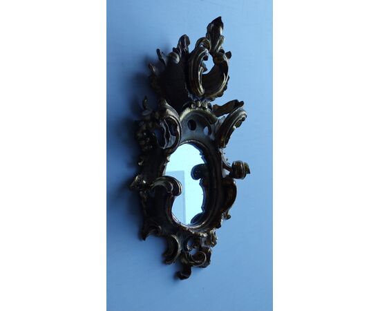 Delicate small mirror