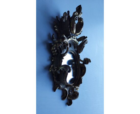 Delicate small mirror