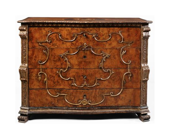 Walnut burl veneered chest of drawers, carved pilasters and gilded "a mecca" frames, rosette with inlaid scene in various woods on the top, Lombardy, 18th century
