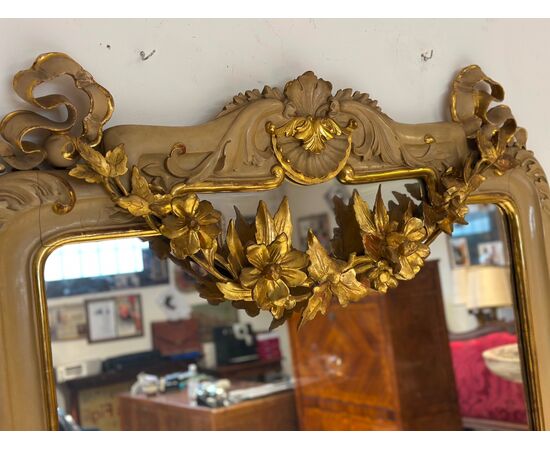 Lacquered and gilded mirror. Siena early 1800s