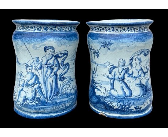 Pair of majolica albarello vases decorated with figures in a rural setting. Lantern signature. Savona.