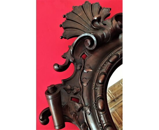 Mirror in carved wood