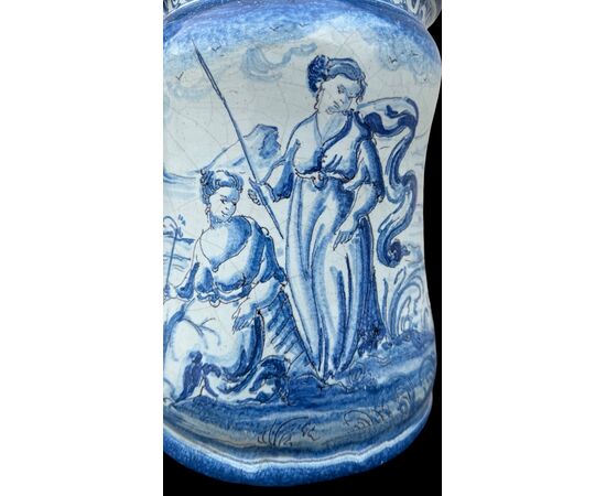 Pair of majolica albarello vases decorated with figures in a rural setting. Lantern signature. Savona.