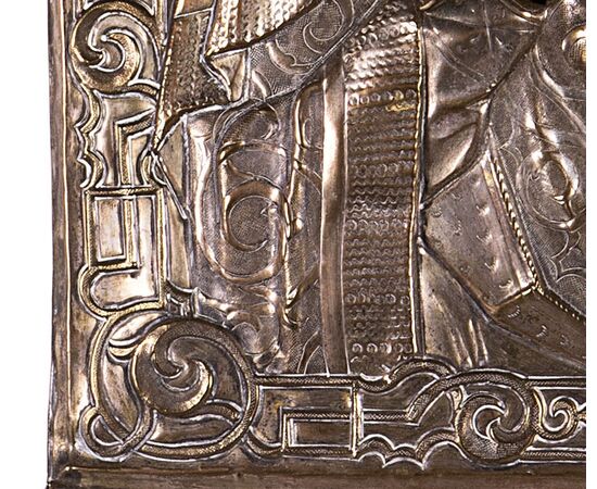 Icon depicting the Madonna and Child, painting on wood panel, embossed silver-plated copper riza, 19th century