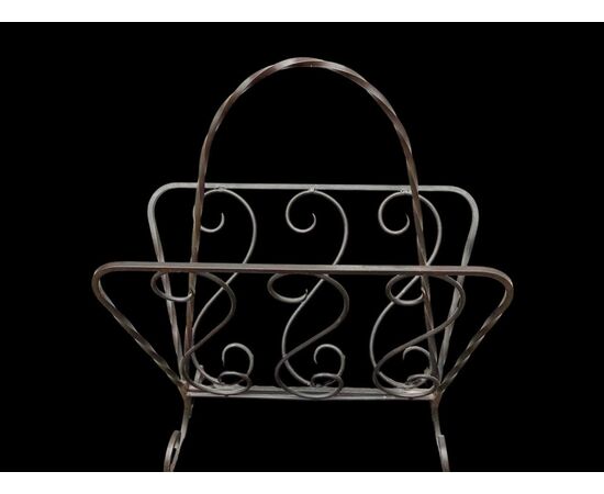 Wrought iron magazine rack.