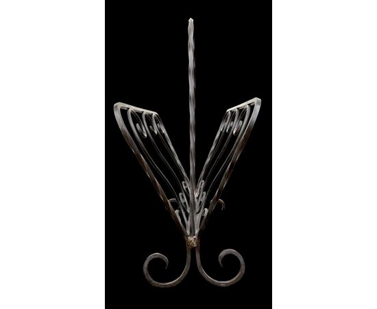 Wrought iron magazine rack.
