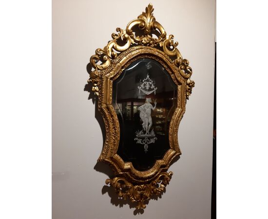 Carved and gilded Venetian mirror     