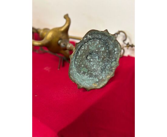 Pair of Florentine bronze oil lamps, early 18th century