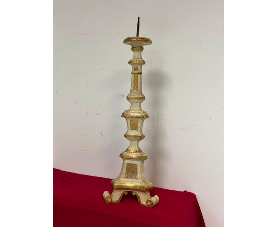 Louis XV lacquered and gilded candlestick