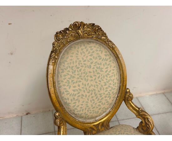 Coppia di poltrone in legno intagliato e dorato. XIX secolo