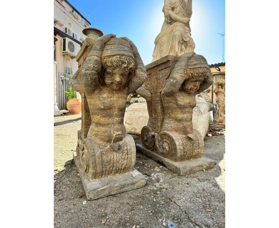 
Coppia di basamenti in peperino con Atlanti, XIX secolo
