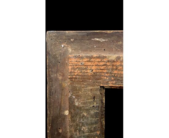 Carved and gilded wooden frame.