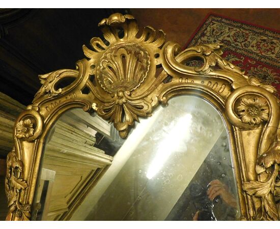 A specc218 carved and gilded mirror, mis. h cm 146 x 80     