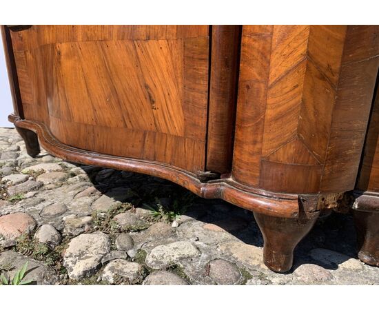 Pair of walnut veneered corner cabinets. Venice, 18th century.