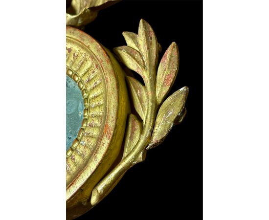Small gilded wooden oval mirror with bow - Italy, late 18th / early 19th century