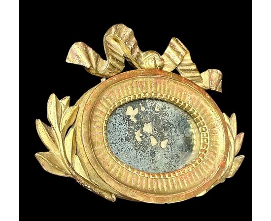 Small gilded wooden oval mirror with bow - Italy, late 18th / early 19th century