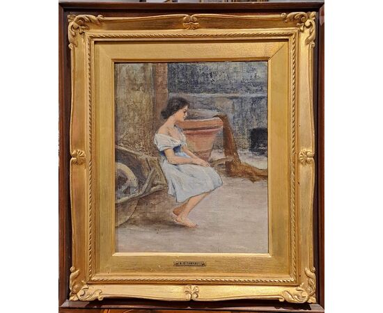 YOUNG WOMAN SITTING WITH WHEELBARROW - ADOLFO TOMMASI (1851 - 1933)