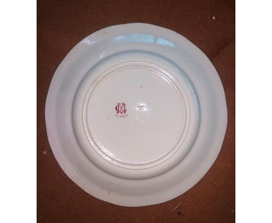 Earthenware plate with decal decoration. Inscription: L&#39;ombromanie.Francia     