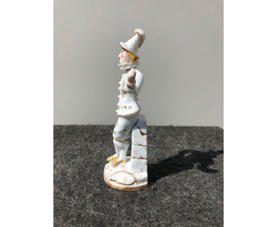 Perfume bottle in porcelain depicting a page. France     