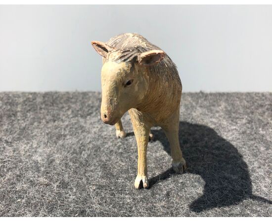 Crib sculpture depicting a sheep in polychrome wood and glass eyes.Italy     