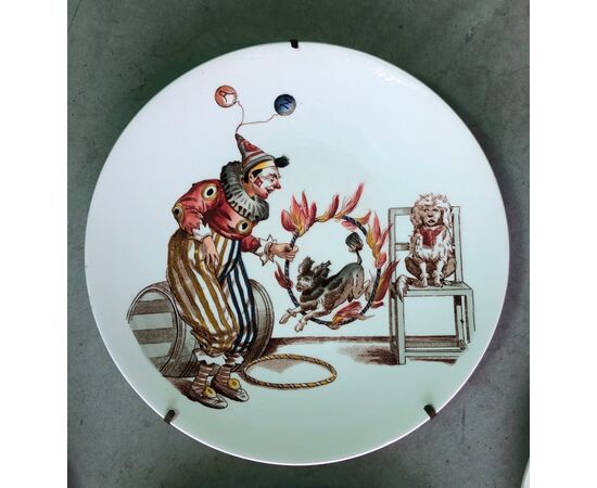 Series of six earthenware dishes with decal decal decoration. Clown sets. Richard, Milan.     