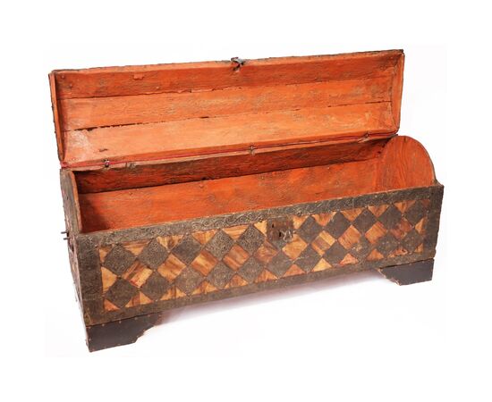 Solid fir chest covered in velvet and sheet metal diamonds with embossed engravings, Italy, 16th century