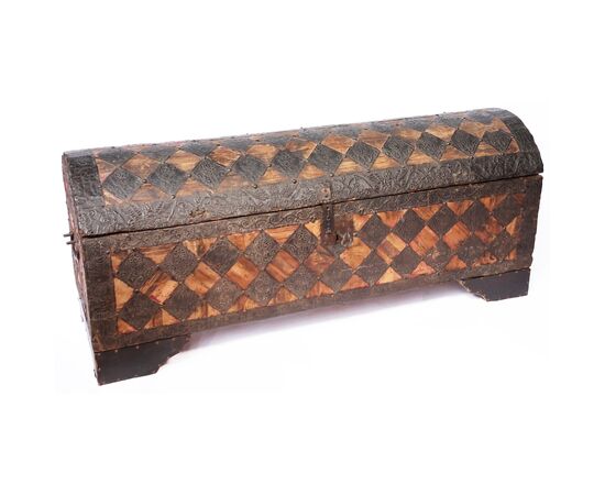 Solid fir chest covered in velvet and sheet metal diamonds with embossed engravings, Italy, 16th century