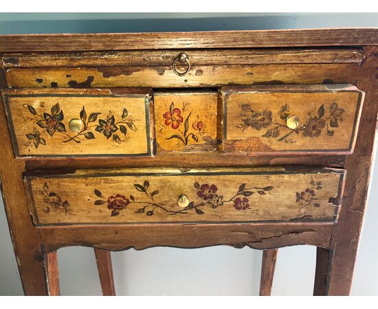 Lacquered coffee table with floral decoration.Italy     