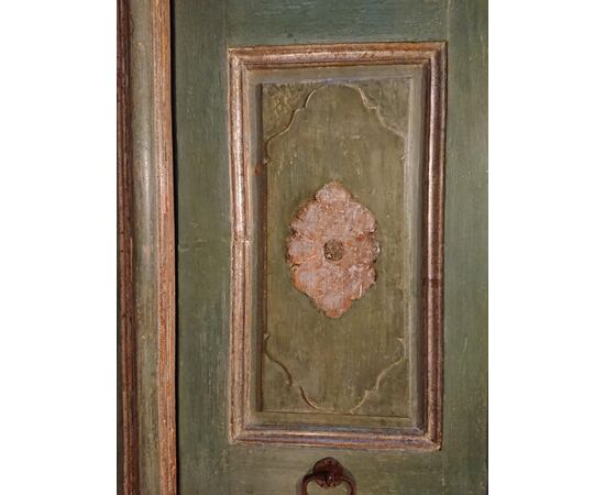 Beautiful two-leaved door with camouflaged frame     