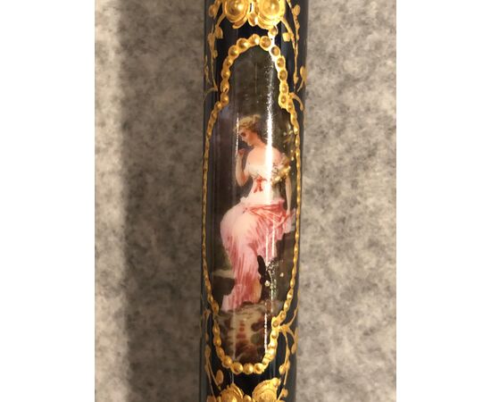 Evening stick with porcelain knob painted with female figures. France.     
