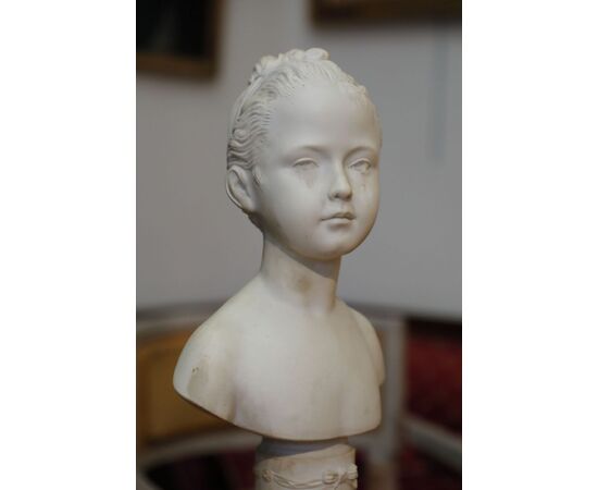 Small bust depicting a girl in bisque     