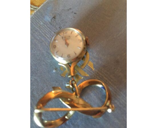 Gold and enamel women&#39;s watch pin     