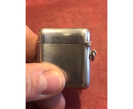 Silver matchbox with enamel stamp decoration. Italy.     