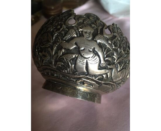Embossed silver container with cherubs     
