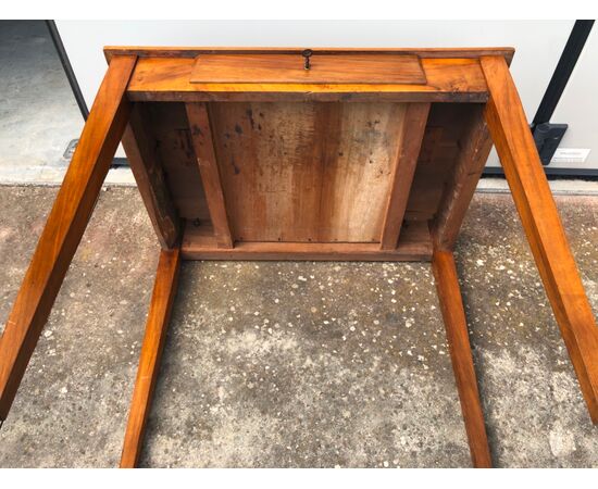 Blond walnut coffee table with one drawer, Directory period.     