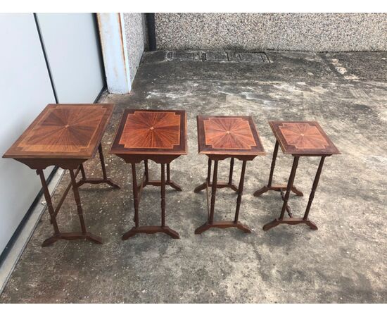 Mahogany coffee table consisting of 4 coffee tables inserted one inside the other with inlaid tops. France.     