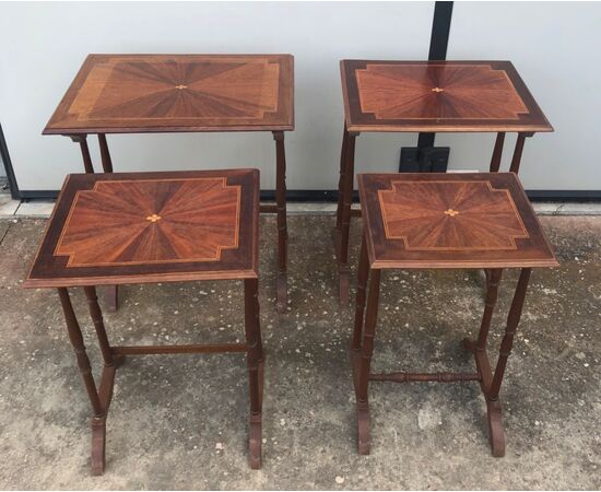 Mahogany coffee table consisting of 4 coffee tables inserted one inside the other with inlaid tops. France.     