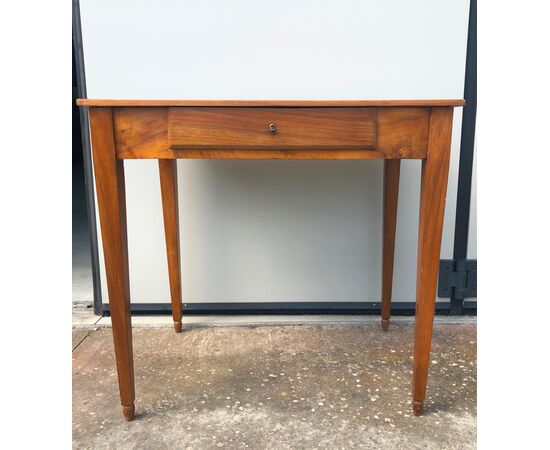 Blond walnut coffee table with one drawer, Directory period.     