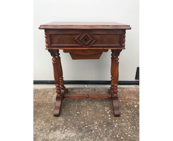 Mahogany work table with feather veneered top. Luigi Filippo period.     