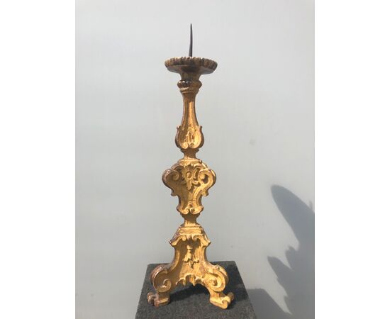 Carved and gilded wooden candlestick.Genoa.     
