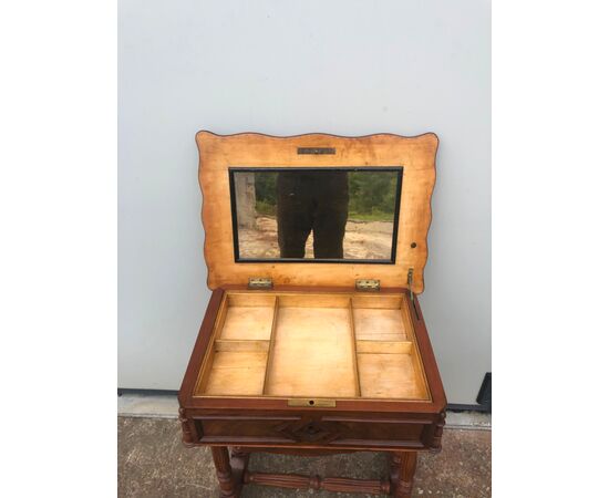 Mahogany work table with feather veneered top. Luigi Filippo period.     