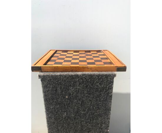 Cherry and rosewood chessboard with containers and drafts.     