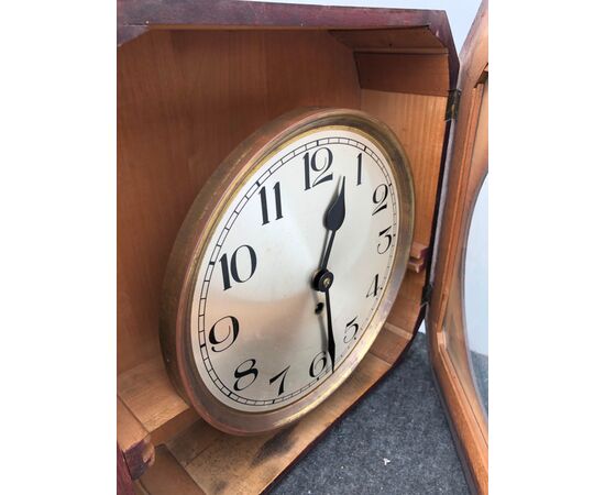 Wall clock in oak wood. Deco period.     