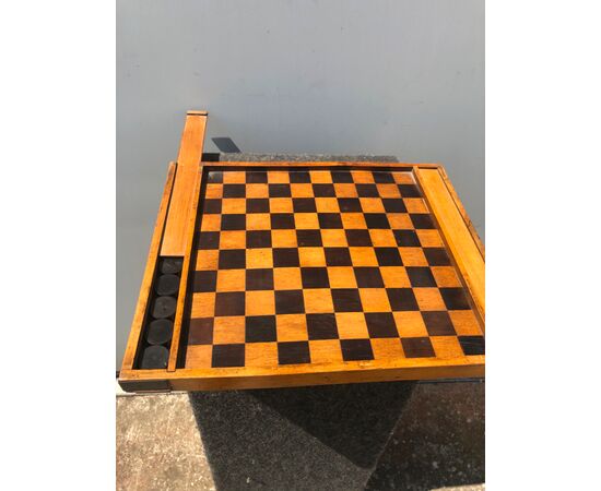 Cherry and rosewood chessboard with containers and drafts.     