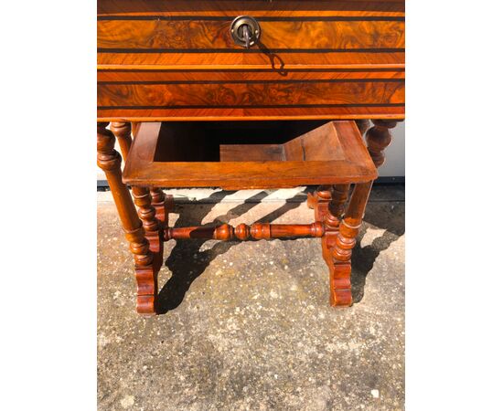 Work table in walnut veneered in briar with threads.     