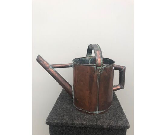 Pouring-copper watering can.     