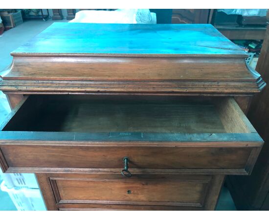 Faux walnut secretary desk in walnut with 4 external drawers and 4 internal drawers.     